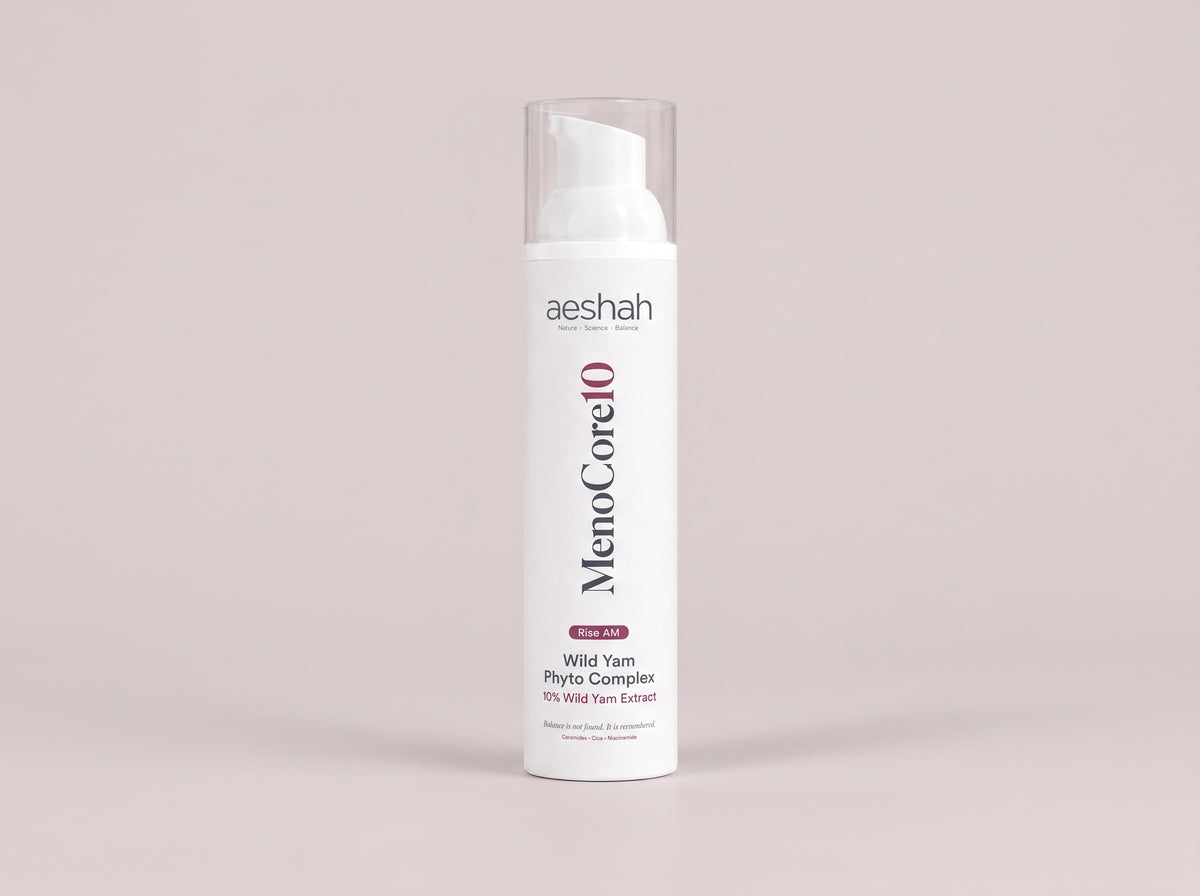 MenoCore 10 airless-pump packaging concept on a soft rose-grey studio background